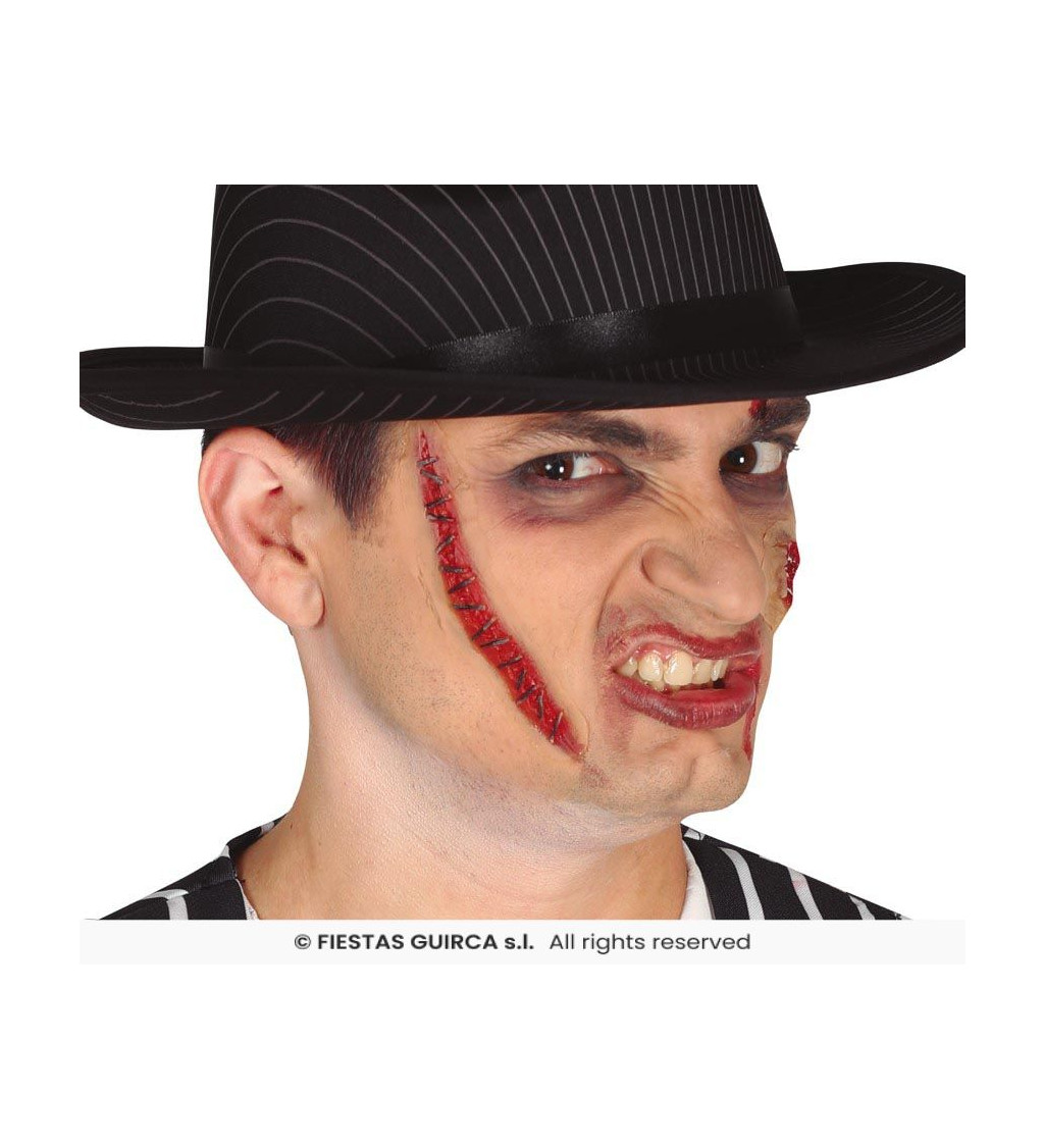 Zašitá jizva s latexem