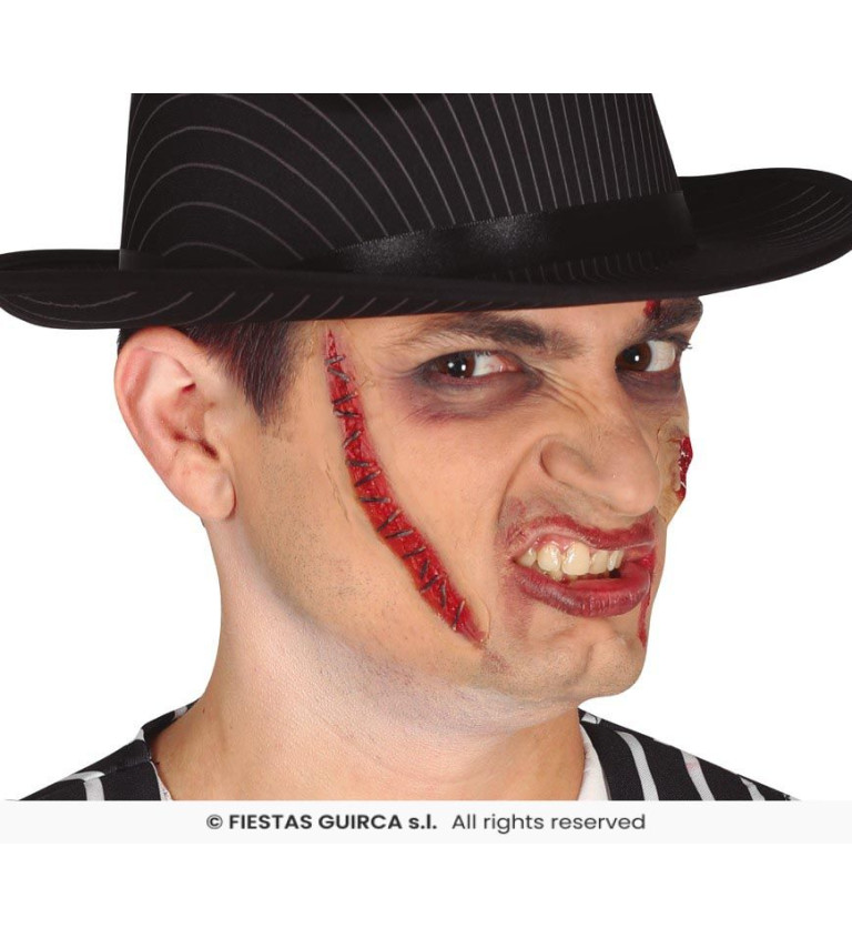 Zašitá jizva s latexem